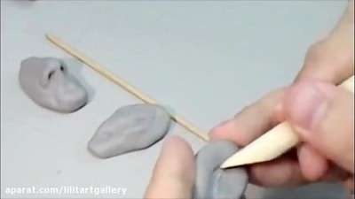 آموزش مجسمه‌سازی اجزای صورت انسان با خمیر و ابزار چوبی